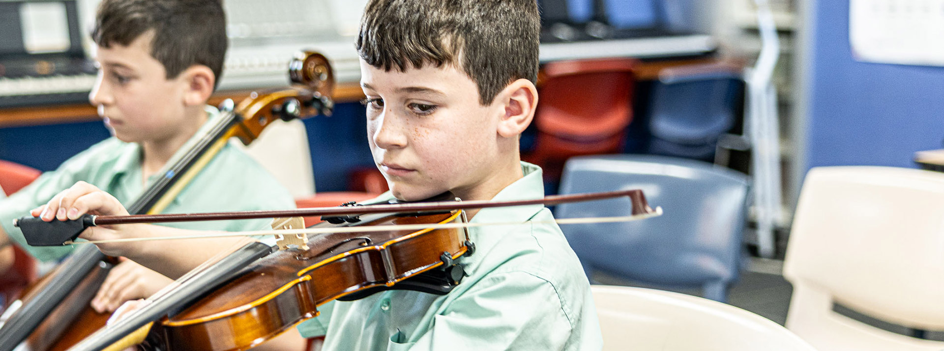 Students playing violin at Our Lady of the Way Catholic Primary Emu Plains