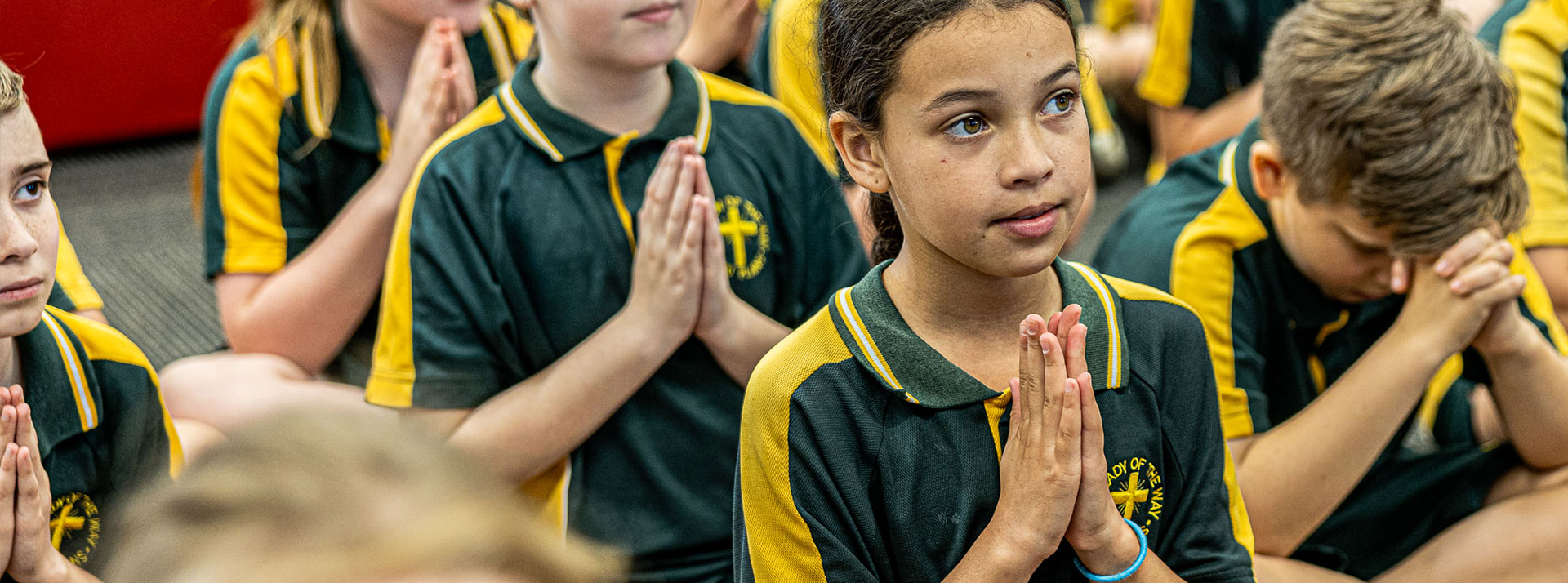 Students praying at Our Lady of the Way Catholic Primary Emu Plains