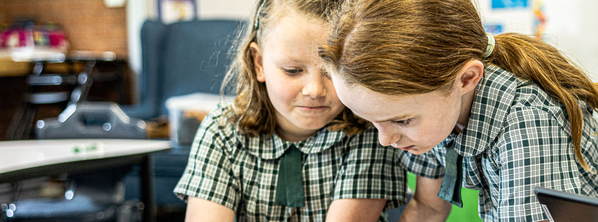 Our Lady of the Way Catholic Primary Emu Plains girls collaborating in class