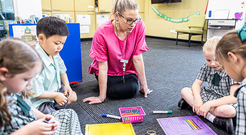Teacher with students at Our Lady of the Way Primary Emu Plains