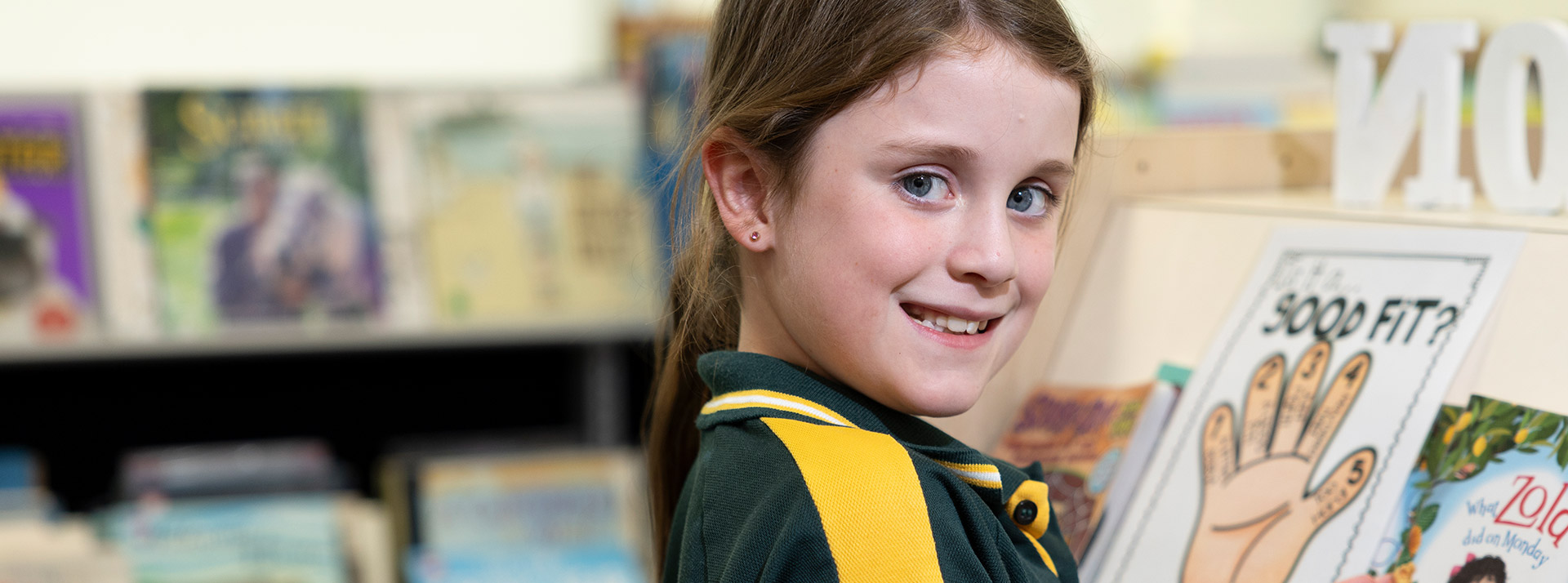 Student in the Our Lady of the Way Catholic Primary Emu Plains school library